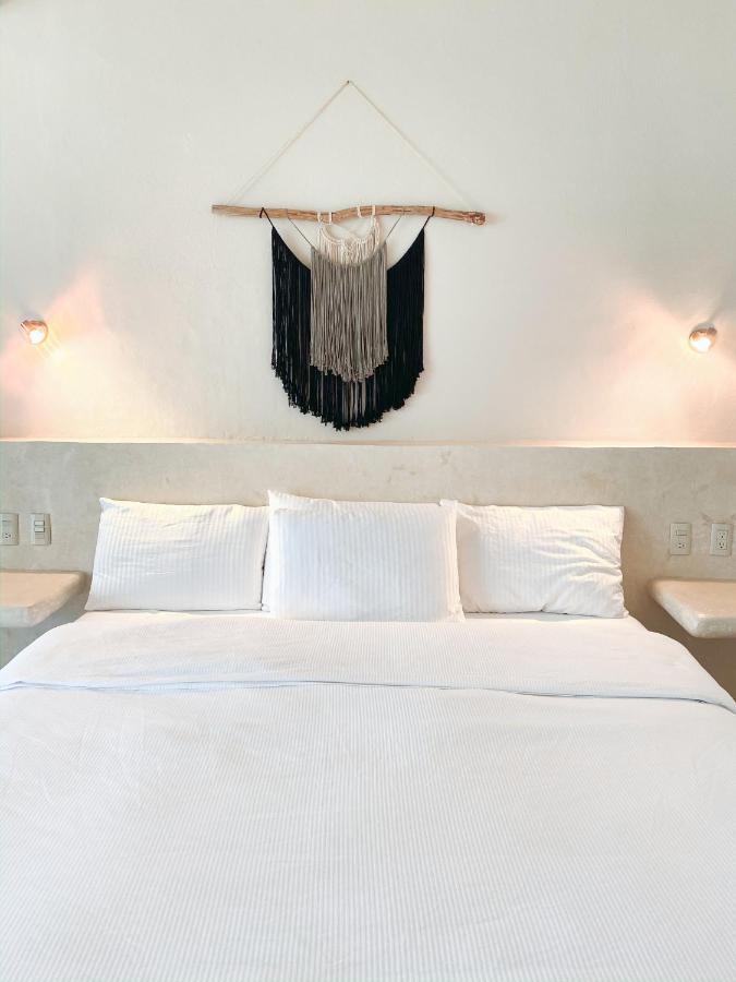 Suite con cama extragrande y vistas al mar